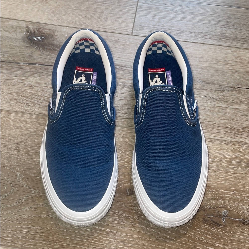 Vans Slip-On Canvas Sneakers in Navy Blue